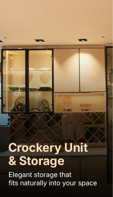 Crockery Unit & Storage: Elegant storage that fits naturally into your space, shown in a modern kitchen display with glass-front cabinets and dishes.